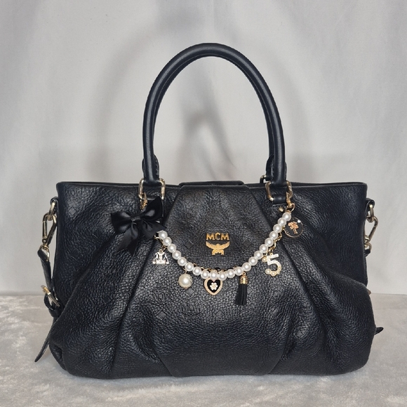 MCM Black Leather Handbag with Gold Accents - Picture 3 of 17